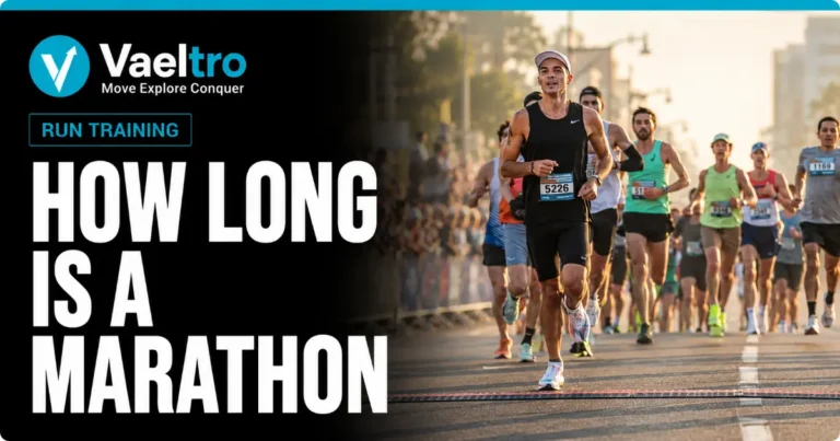 How Long Is a Marathon? Distance in Miles, KM and What to Expect Male marathon runner approaching the finish line on a city road course during a morning race