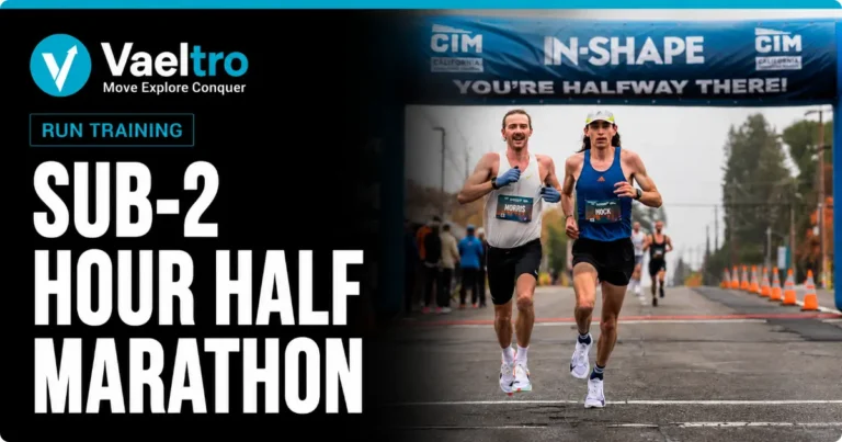 Runner maintaining race pace during a half marathon on an open road course